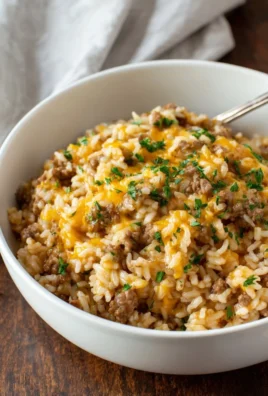 Cheesy Ground Beef and Rice Casserole baked in a dish, ready to serve.