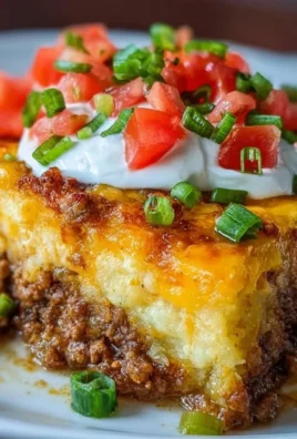 Cheesy Keto Taco Casserole served in a dish with toppings