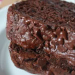 Delicious chocolate zucchini loaf fresh from the oven, topped with chocolate chips