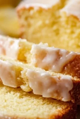 Delicious slice of easy moist lemon loaf with a lemon glaze on top