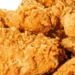 Golden crispy air fryer fried chicken served on a plate