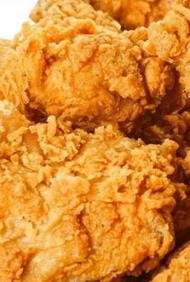 Golden crispy air fryer fried chicken served on a plate
