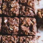 Healthy no bake chocolate granola bars made with oats, nuts, and chocolate.