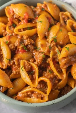 High protein taco pasta dish served in a bowl with toppings