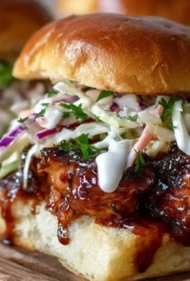 Delicious Honey Chipotle Garlic Chicken Sliders on a serving platter.