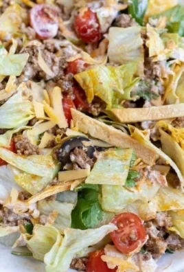 Low carb taco salad bowl with fresh ingredients and vibrant toppings