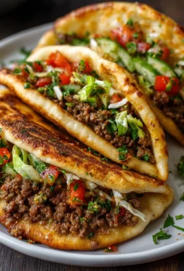 Mediterranean ground beef pita pockets filled with fresh ingredients