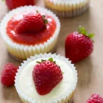 Mini cheesecake cupcakes on a plate, ready to be enjoyed for dessert.