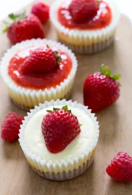 Mini cheesecake cupcakes on a plate, ready to be enjoyed for dessert.