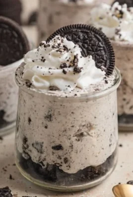 Delicious No Bake Oreo Cheesecake Cups topped with crushed Oreos