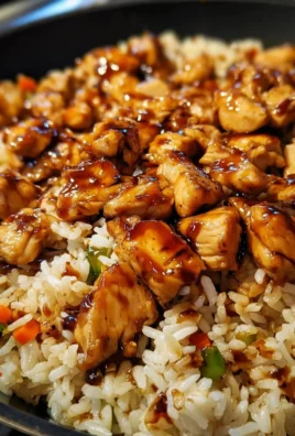 One-Pan Bold Honey BBQ Chicken Rice dish with vibrant colors and savory ingredients.