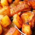 Deliciously seasoned roasted potatoes served on a plate