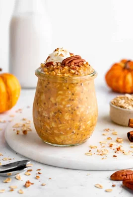 Delicious bowl of Pumpkin Pie Overnight Oats with spices and pumpkin puree