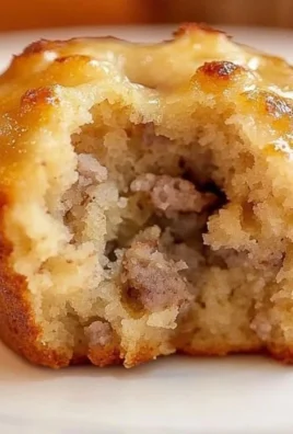 Plate of golden sausage pancake bites, a delightful breakfast option.