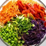 Delicious sesame noodle salad with fresh vegetables and sesame dressing