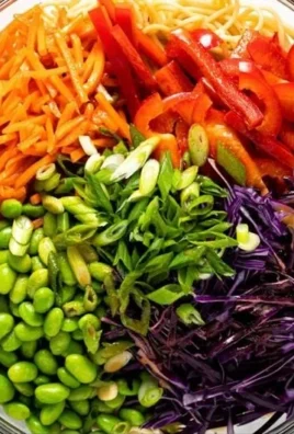 Delicious sesame noodle salad with fresh vegetables and sesame dressing