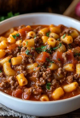 Bowl of hearty Southern Style Goulash with pasta and vegetables.